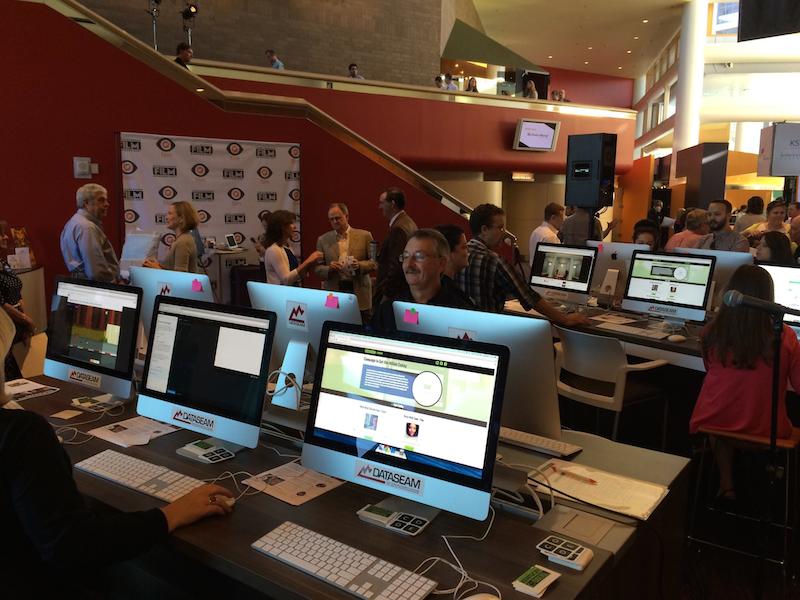 People learn to code with Kentucky Coders website in lobby at IdeaFestival